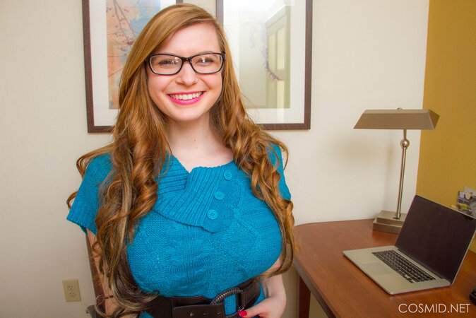 Chubby coed with glasses playfully strips and demonstrates her enormous tits