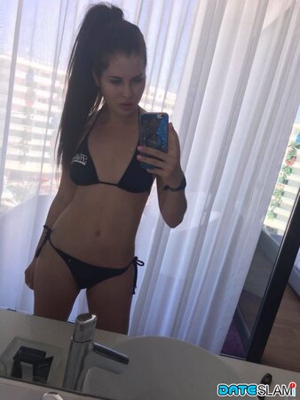 Russian girl Cassie Fire enjoys self-contemplation and self-donation via pics