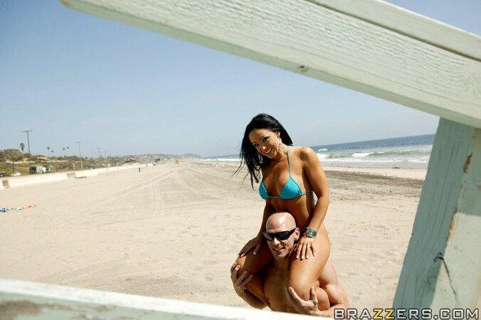 Bald man finds brunette MILF on beach and takes to his room for fucking