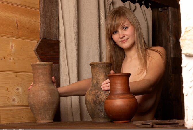 Solo pictures of the young girl with a beautiful face and big natural tits