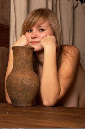 Solo pictures of the young girl with a beautiful face and big natural tits