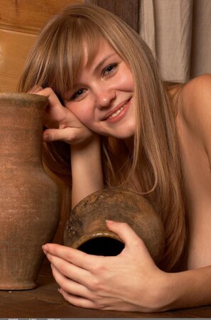 Solo pictures of the young girl with a beautiful face and big natural tits