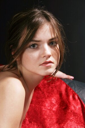 Slender babe takes off her sexy white nightgown and shows off tiny tits