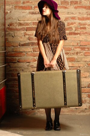 Skinny peels off blown dress showing off butt and tits on her suitcase