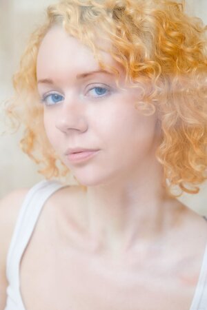 Curly red-haired teeny gets wet in the shower and teases with her cute tits