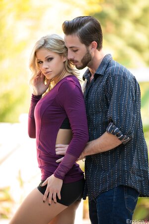 Sporty blonde girl attracts bearded guy and gets naked in the fresh air