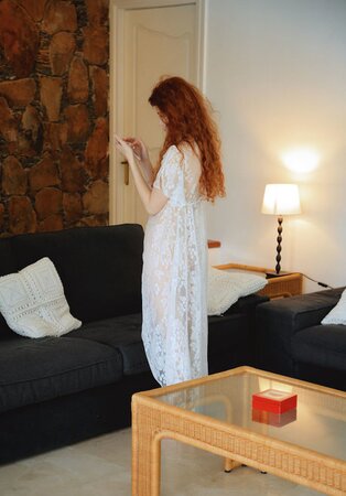 Amazing redhead in lace white gown plays with her sweet pink pussy and moans
