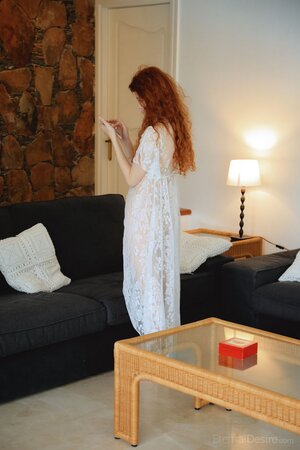 Amazing redhead in lace white gown plays with her sweet pink pussy and moans