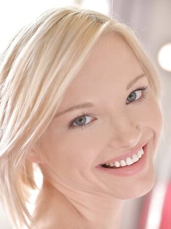 European blonde hottie stretches her teen pussy and sticks fingers into it