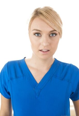 Hot blond masseuse poses on the massage table and pulls off her uniform