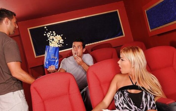 Stranger focuses on blonde chick’s sexy feet and initiates wild sex in the cinema