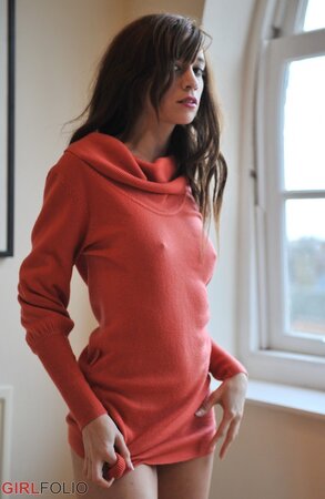 Sensitive brunette girl enjoys herself while revealing underwear by the window