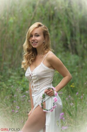 Gorgeous blonde loves posing outdoors and is ready to reveal titties