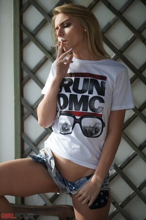 Bad girl loves smoking cigarettes and drinking beer while being totally naked