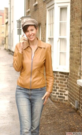 Playful brunette honey pulls off sexy underwear to expose big natural tits