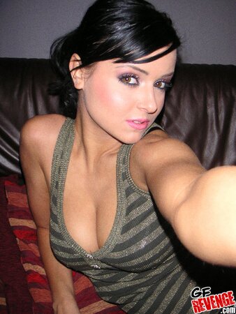 Playful brunette honey takes kinky selfies showing off big natural tits