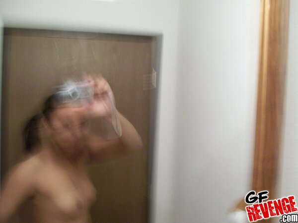 Amateur Ebony girlfriend films her shaved twat and ass in the bathroom