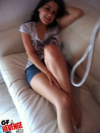 Big-assed amateur hottie plays with her trimmed pussy for the camera