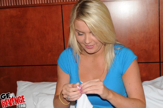Hot blonde chick tries on new clothes showing off her round booty and big tits