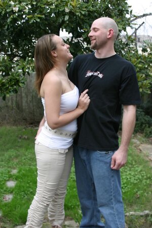 Curvaceous chick and her bald boyfriend have sex in front of the camera