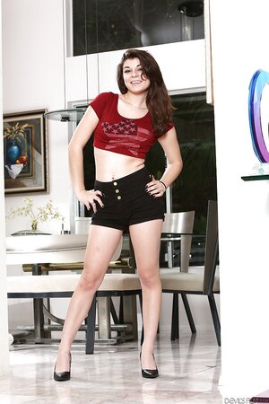 Beautiful teen on heels models naked revealing every part of her lovely body