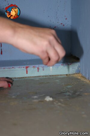 Red-haired glory-hole whore gets on the knees and sucks thick black dick