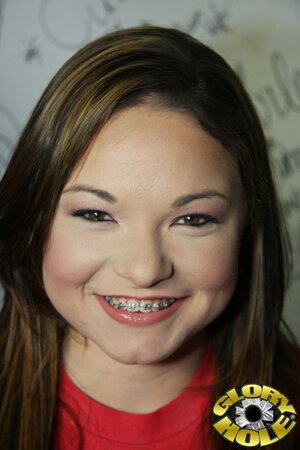 Chubby teen chick with braces has interracial BJ and sex in the glory-hole room