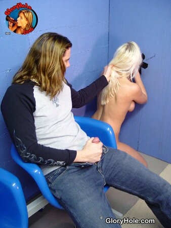 Blonde sucks thick black dick through the glory-hole for the cuckold to watch