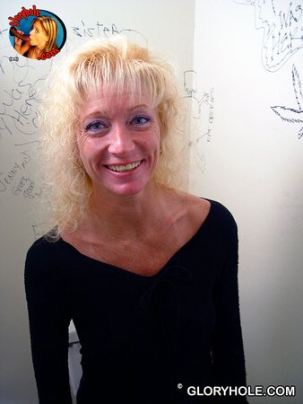 Mature nympho gives gloryhole blowjob while cuckold husband touches her