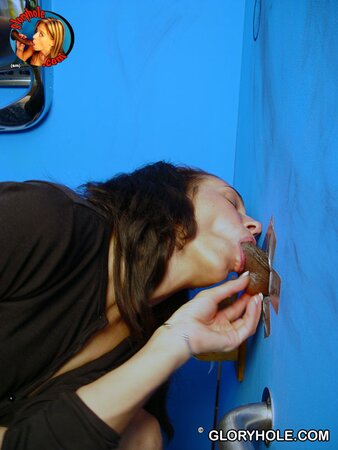 Black-haired MILF masturbates while giving BJ to black stranger via gloryhole