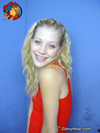 Playful blond teen with small tits improves sucking skills in gloryhole room