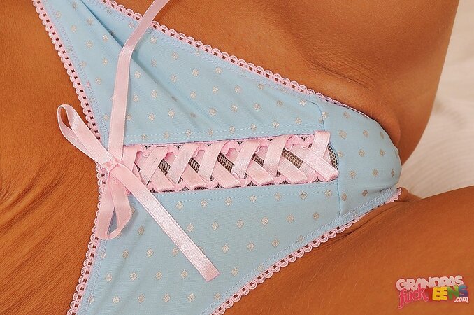 Lustful blond bimbo is playful enough to undress and slip panties into pussy
