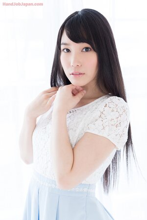 Lovely Asian sweetheart exposes luscious body and gives a messy handjob