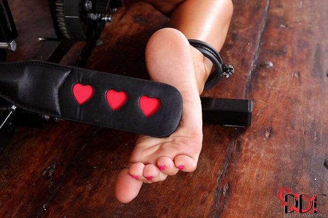 Submissive blond hussy gets spanked while BDSM machine fucks her cunny