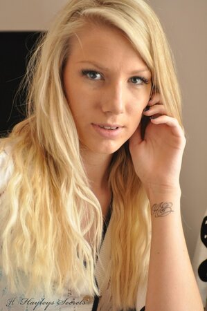Lecherous blond gal sensually poses naked to reveal her sweetest parts