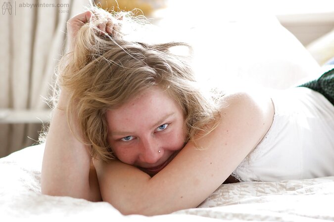 Blondie Ela cracks a smile while showing off during a sunny day