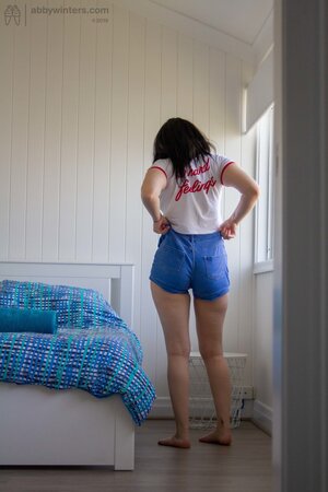 See a dark haired girl with a tight pussy and narrow waist