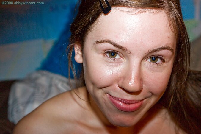 Precocious girl showing off her toned shape in a solo gallery