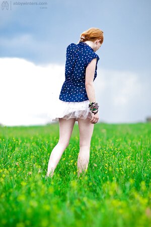 Redheaded beauty in badass glasses is going to show her twat