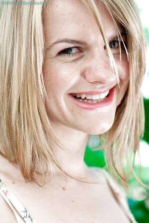 Blondie is going to smile a lot and tease the camera outside