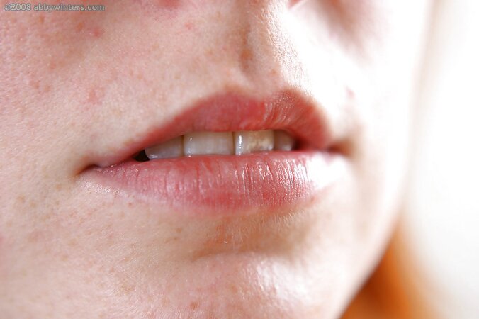 Redheaded beauty shows her crotch and sexy looking booty