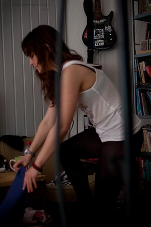 Brunette with natural breasts is going to show her backside too