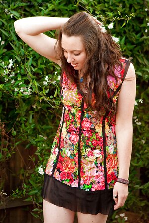 Adorable lady exploring the great outdoors with her bush in tow
