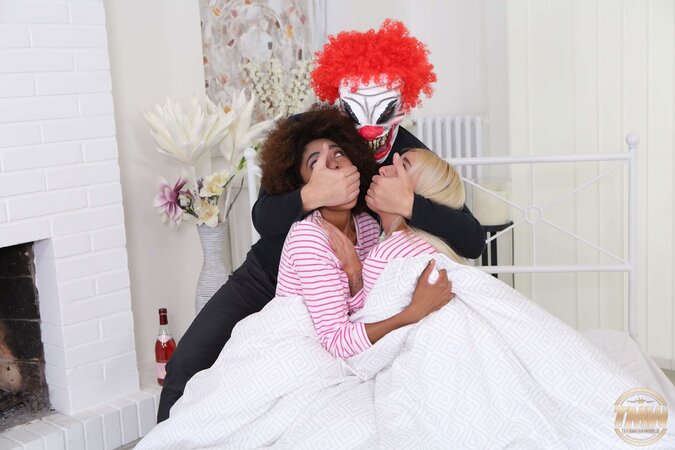 Spooky sex scene with two perfect girls that will screw a clown