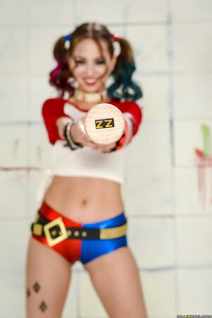 Hot chick with a bat equally loves posing dressed up and fully naked