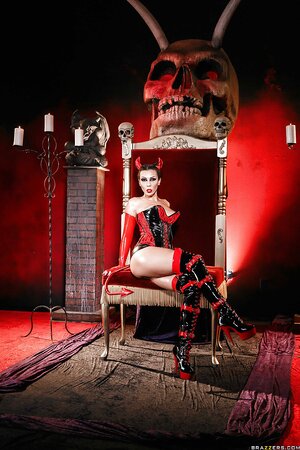 Devil temptress seduces mortals by modeling in erotic latex outfit