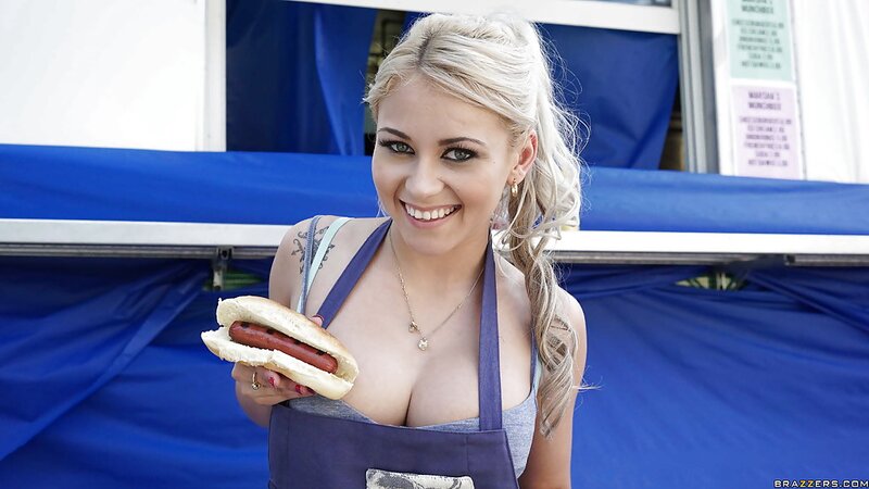 Cute blonde girl wants to treat us with a fresh hot dog and appetizing tits