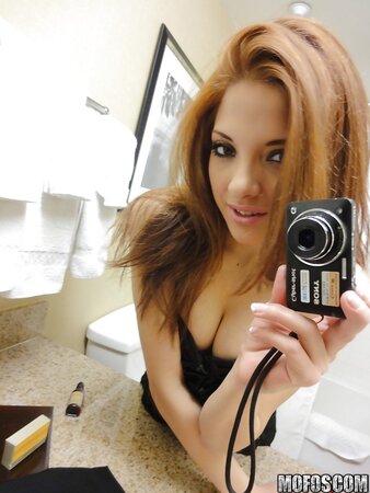 Frisky teen girl takes pics of her body taking clothes off step by step
