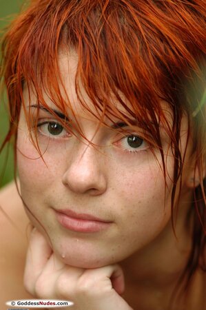 Redhead with perky nipples is getting wet while showering