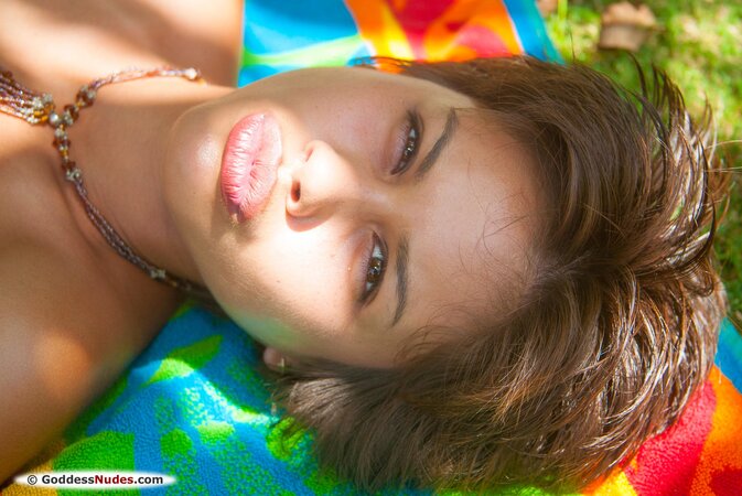 Summer vacation makes her smile almost as much as the pool